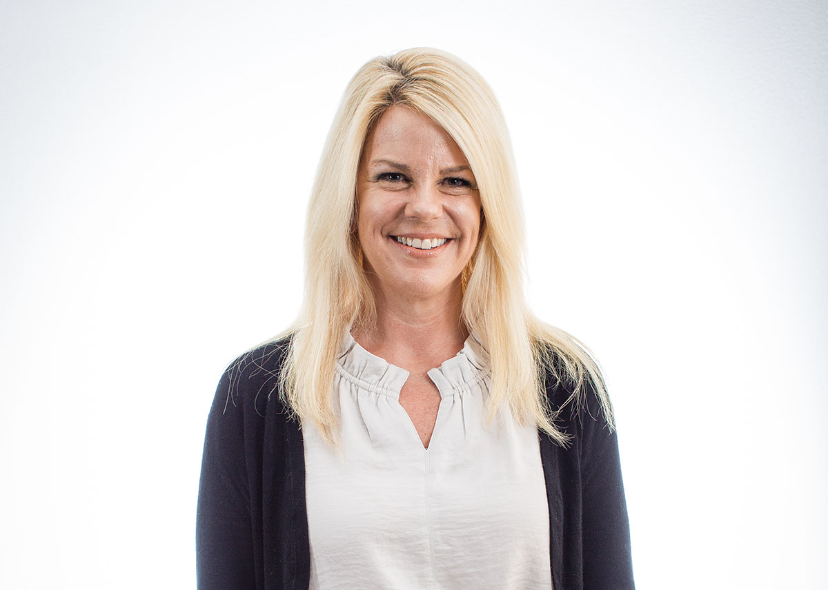 Professional headshot photo of Stacey Standlick, Agili Assistant to the President, Office Manager.