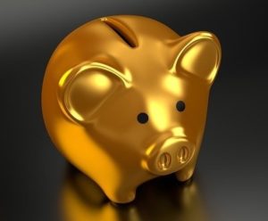 Gold piggy bank symbolizing successful financial planning, saving and investment planning