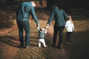 Family walking together - an example of those receiving child tax credit