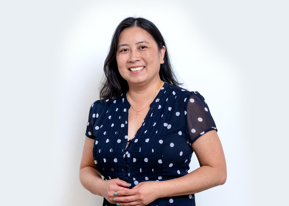 Professional headshot photo of Van Nguyen, FPQP™, Agili Principal, Client Services Manager.